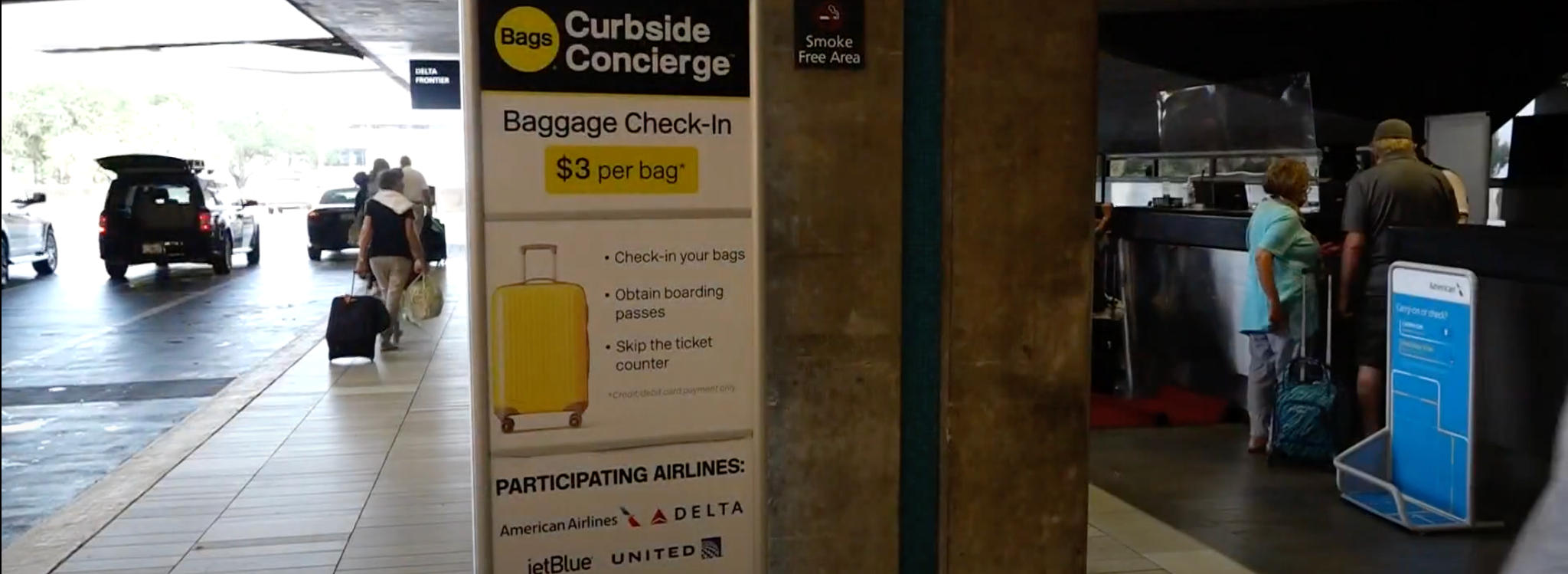 Passengers-using-airport-curbside-bag-checkin