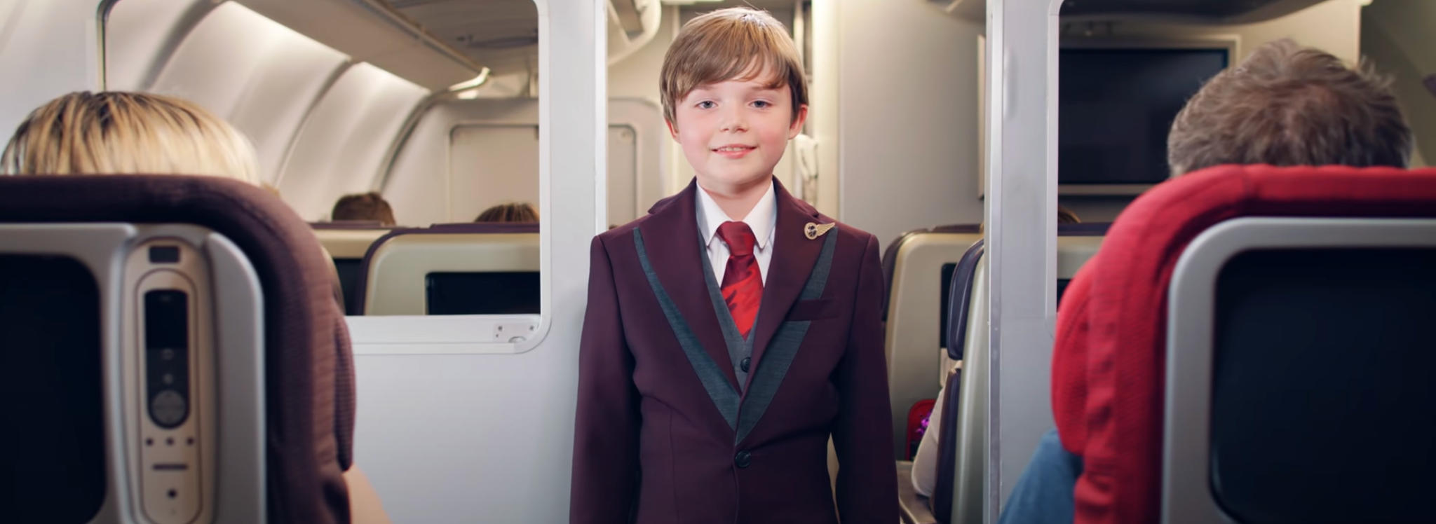 child-on-plane-pretends-to-be-flight-attendant