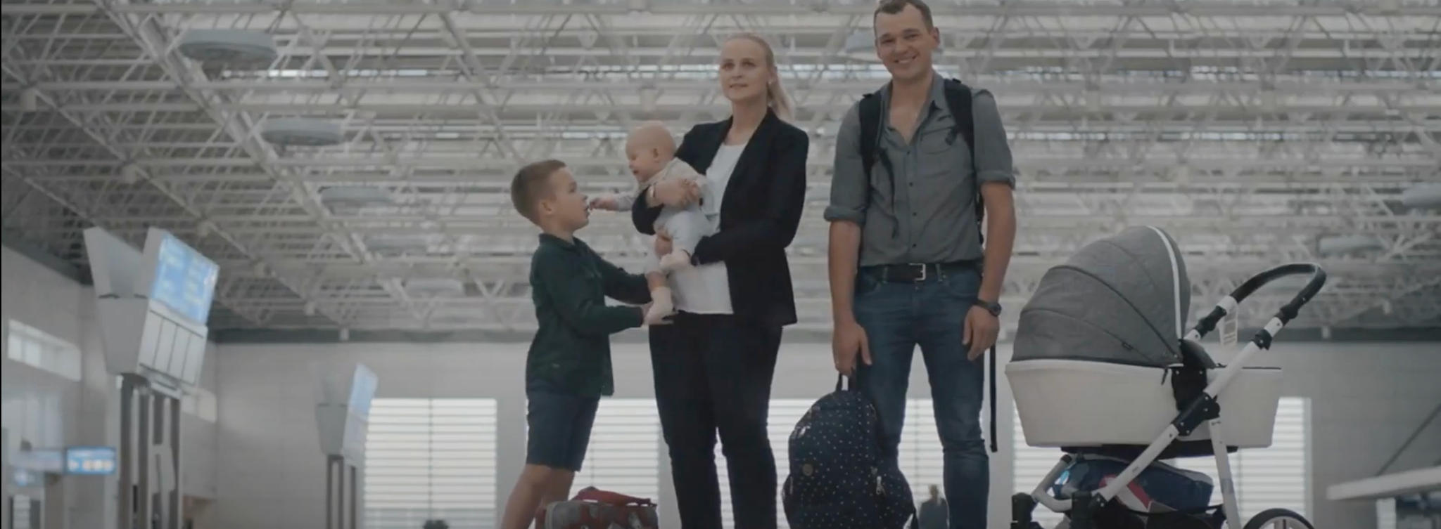 family-with-infant-at-airport