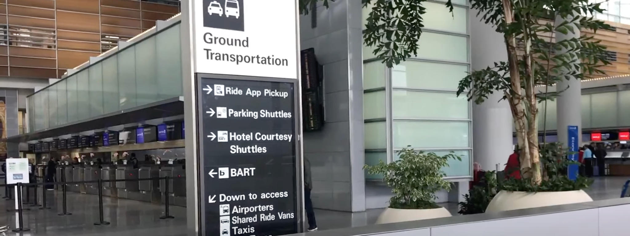 public-transportation-options-displayed-on-airport-signage