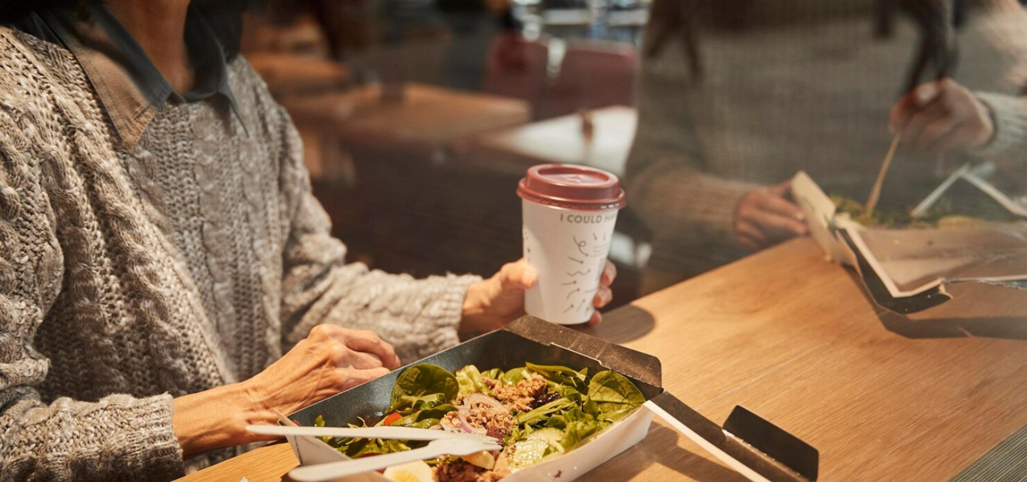 woman-at-airport-restaurant