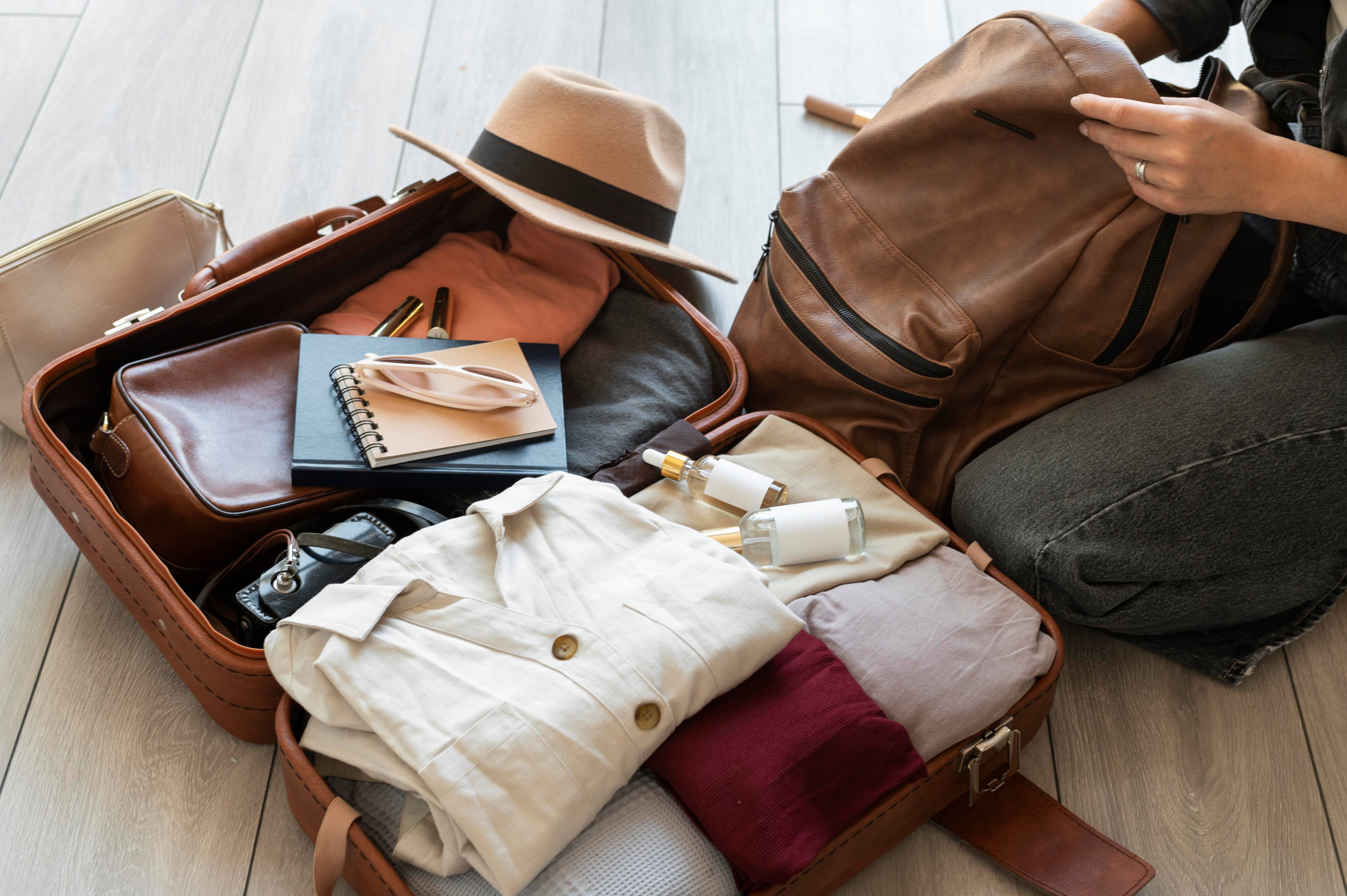 Arrangement of clothes and accessories in a suitcase