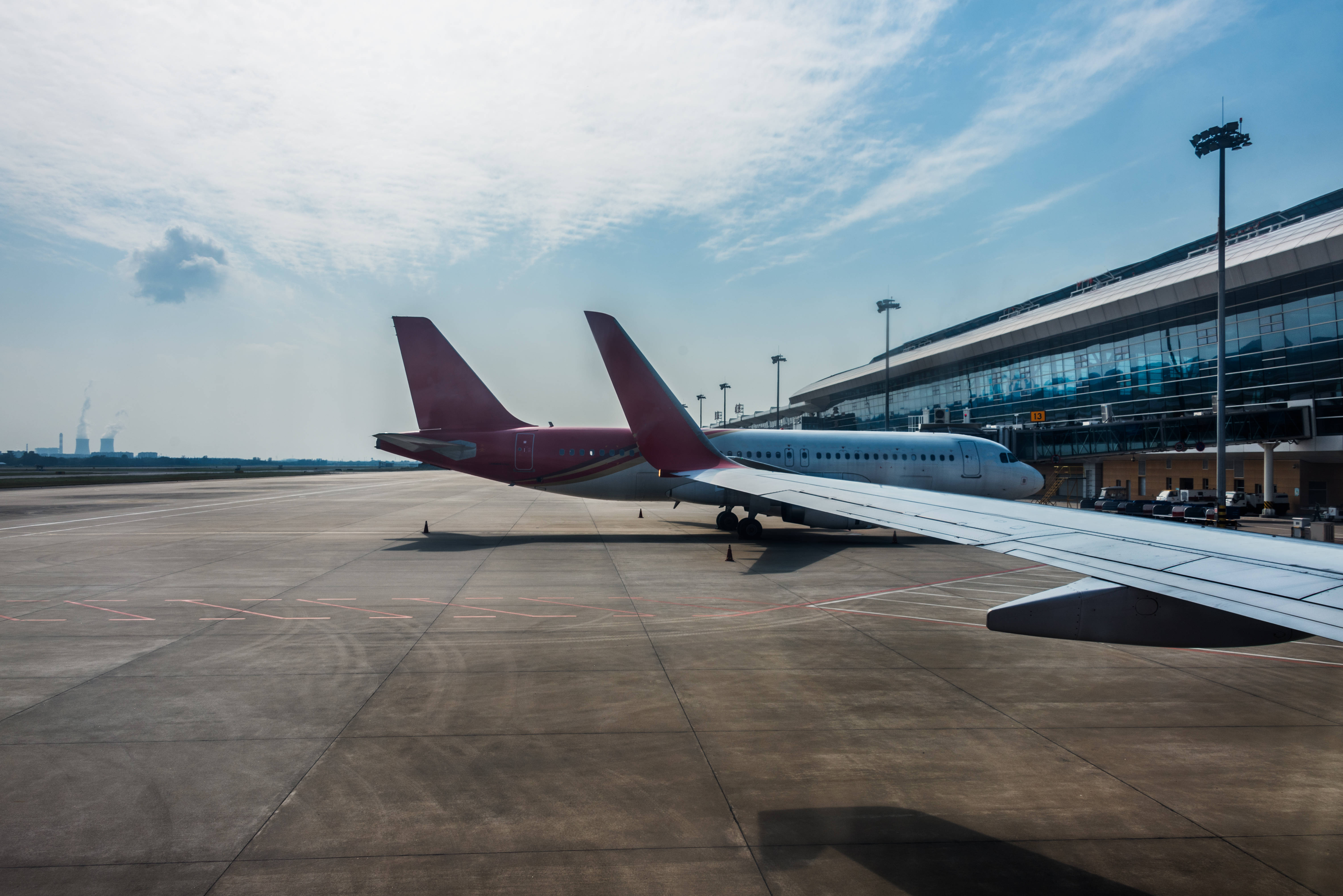 Planes on runway in modern airport