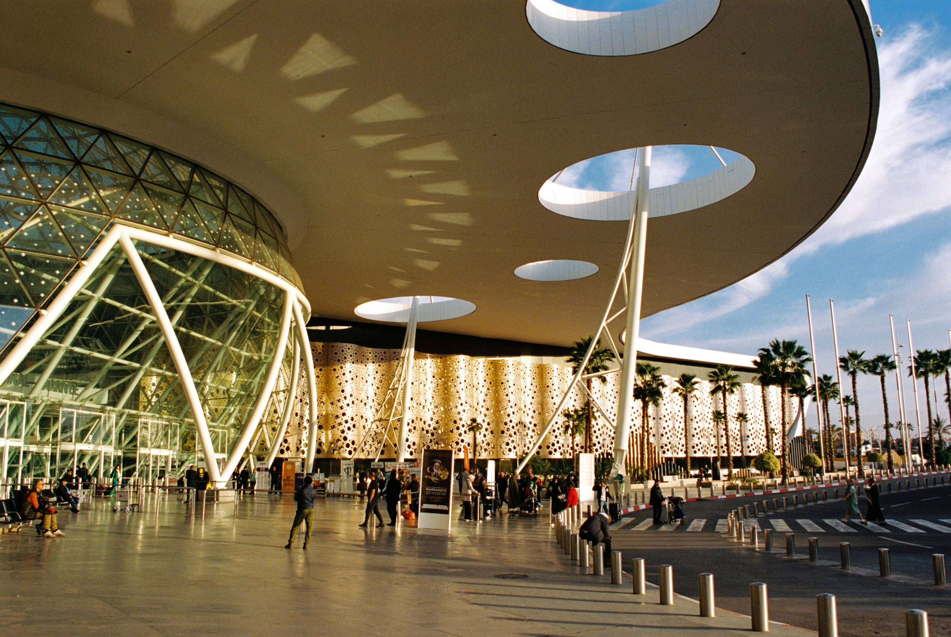 a group of people standing outside of a building