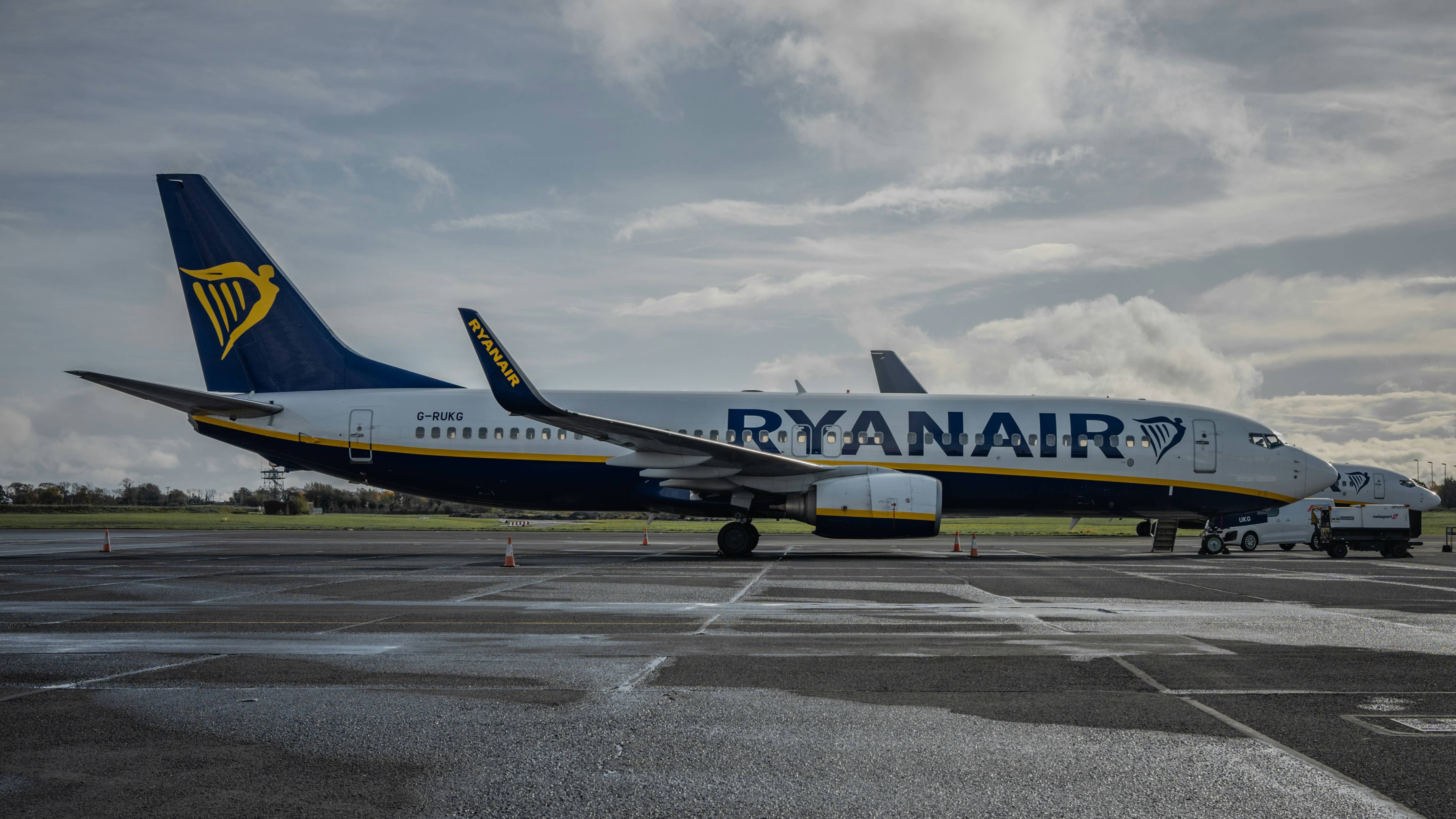 a large passenger jet sitting on top of an airport tarmac