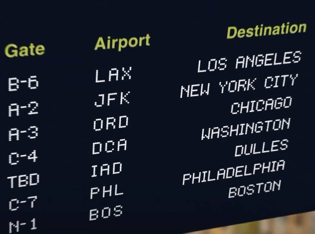 Flight information board displaying various airport IATA codes and flight statuses