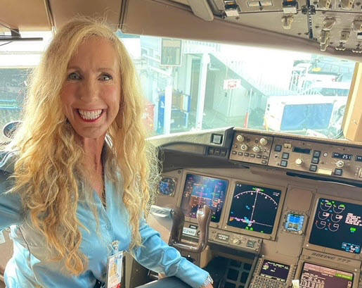 Captain Laura Sitting In Cockpit